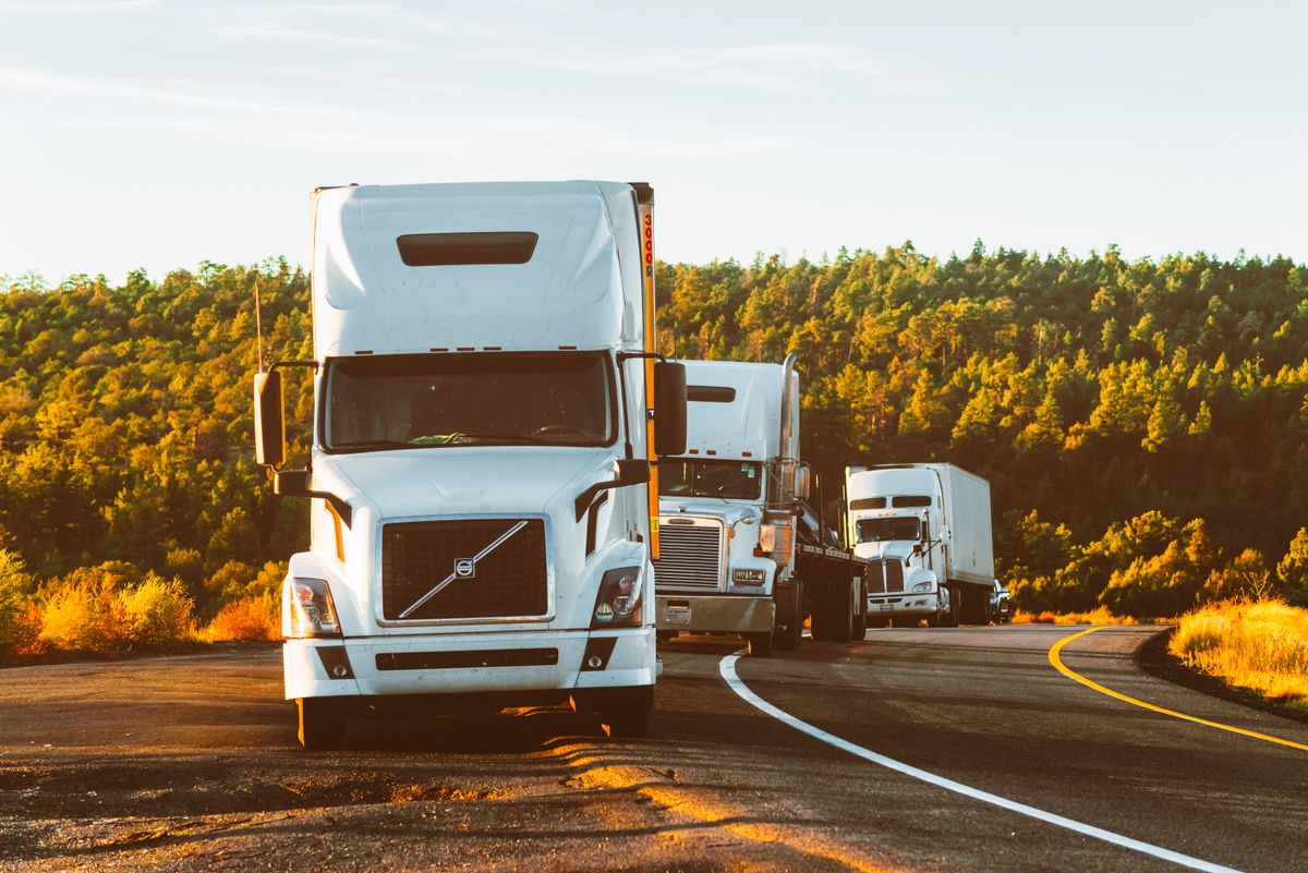 Semi trucks on the highway hauling freight